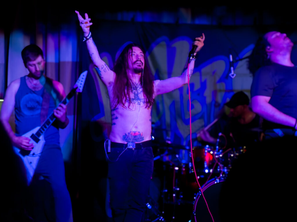 Hooker Spit performing live at the Owl Acoustic Lounge in Lethbridge, Alberta on May 24, 2025